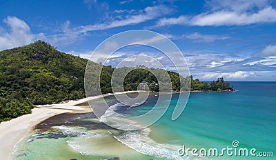 Tropical beach with sea and palm taken from drone. Beach and sea Stock Photo