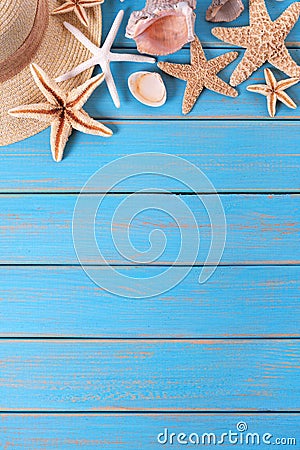 Tropical beach summer starfish background border vertical blue wood deck Stock Photo