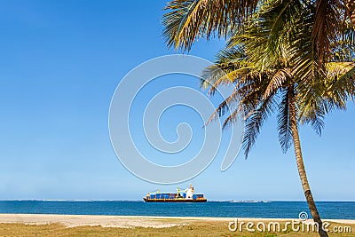 Tropical cargo ship Stock Photo