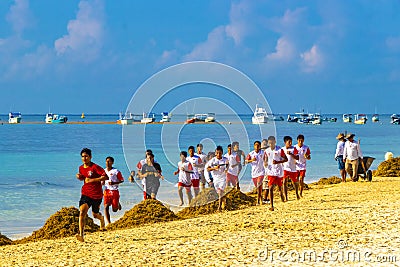 Tropical Caribbean beach Sportsman racer jogger Playa del Carmen Mexico Editorial Stock Photo