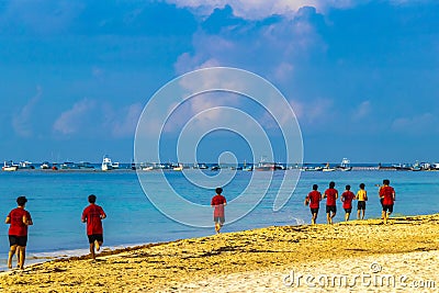 Tropical Caribbean beach Sportsman racer jogger Playa del Carmen Mexico Editorial Stock Photo