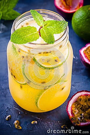 Tropical cocktail with passion fruit, lime and mint Stock Photo