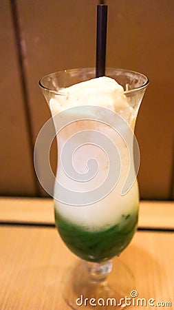 Tropical Delight Cendol in Glass with Creamy Coconut Milk and Green Jelly Stock Photo