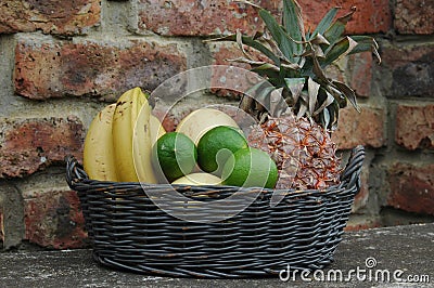 Tropical fruit basket Stock Photo