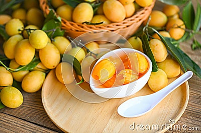 tropical fruit Name in Thailand sweet Yellow Marian Plum Maprang Plango or Mayong chid, Sweet dessert marian plum fruit on bowl Stock Photo