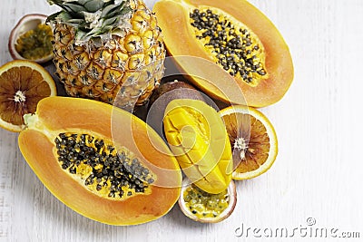 Tropical fruits: papaya, pineapple, mango, passion fruit, orange Stock Photo