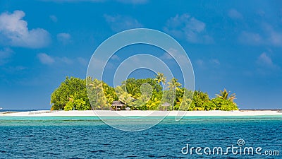 Tropical island of Maldives, lonely island landscape in calm blue sea. Tropical island Stock Photo