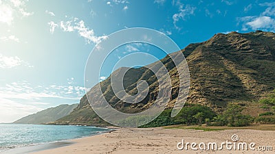 Tropical Makua beach view with mountains and blue sky Stock Photo