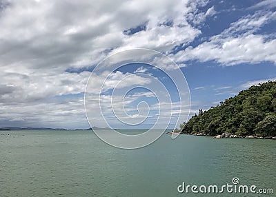 Tropical scene of the Atlantic Ocean against blue sky Stock Photo