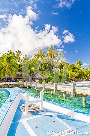 Tropical scene with traditional wooden boat in Maldives, called Dhoni Stock Photo