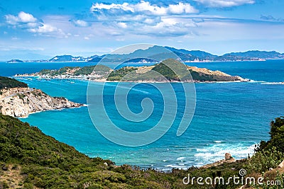 Tropical Seascape with Aerial View of Cam Ranh Bay, Islands, Mountains and Clouds in The Blue Sky Stock Photo