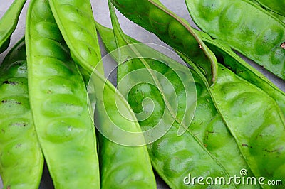 Tropical stinking edible beans on white background Stock Photo