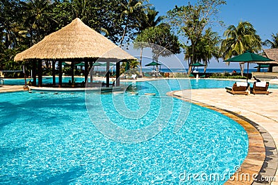 Tropical swimming pool near the beach Stock Photo