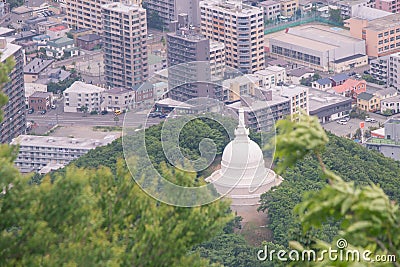 Tropical view of White Sapporo Peace Pagoda from Mount Moiwa in Sapporo City. Stock Photo