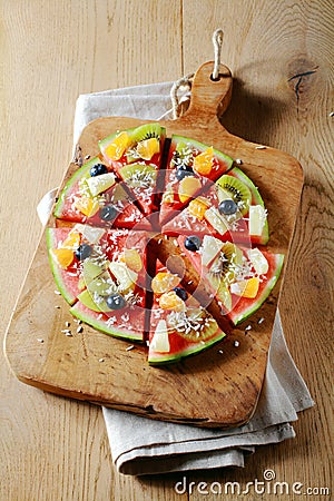 Tropical watermelon pizza for a party dessert Stock Photo