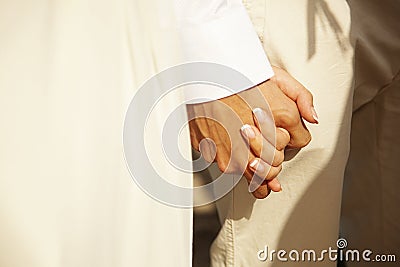Tropical wedding. Couple holding hands. wedding day Stock Photo