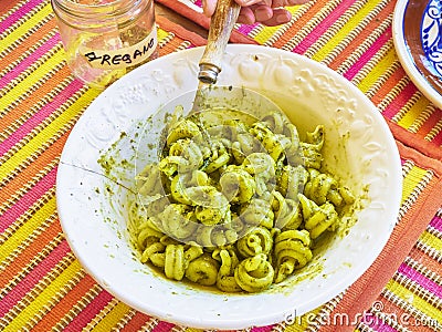 Trottole al Pesto, typical pasta of Campania, on a rustic presentation. Stock Photo
