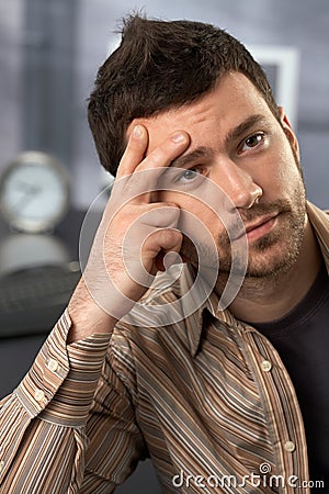 Troubled office worker Stock Photo