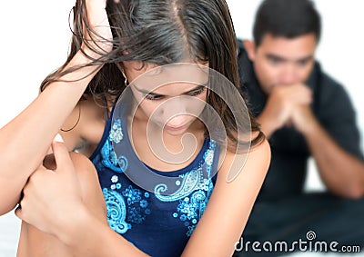 Troubled teenage girl with her worried father Stock Photo