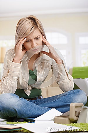 Troubled woman at home Stock Photo