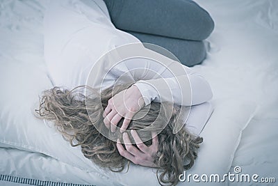 Troubled young woman Stock Photo