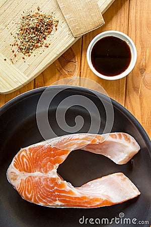 Trout in the pan with the sauce and spices Stock Photo