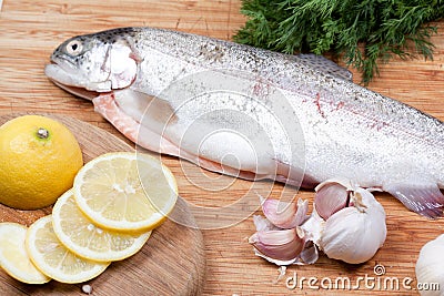 Trout on chopping board Stock Photo