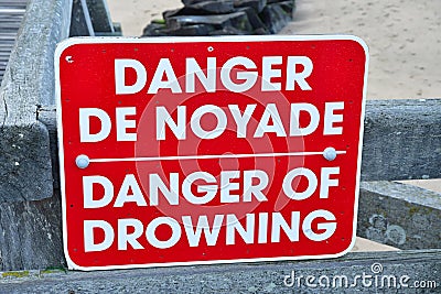 Trouville sur Mer, France - september 27 2019 : danger of drowing sign Stock Photo