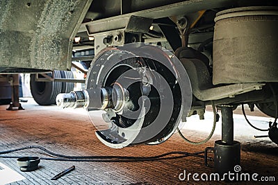 Truck Axle with Break Pads for Maintenance Repair. Auto Fixing Repair Shop. Stock Photo