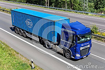 Truck with Cosco container Editorial Stock Photo