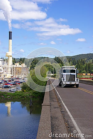 Truck crossing bridge Stock Photo
