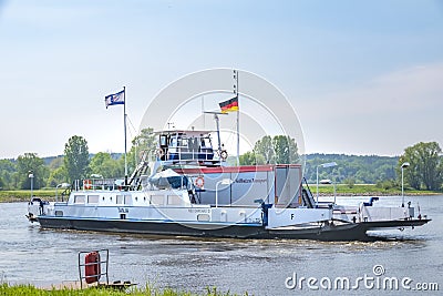 Truck crossing the river Elbe on a ferry at Neu Darchau, Germany Editorial Stock Photo