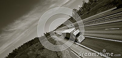 Truck driving on freeway Stock Photo