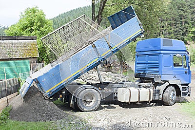 Truck dumping ground Stock Photo