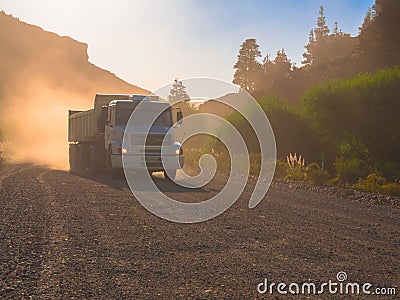 Truck in dust road Stock Photo