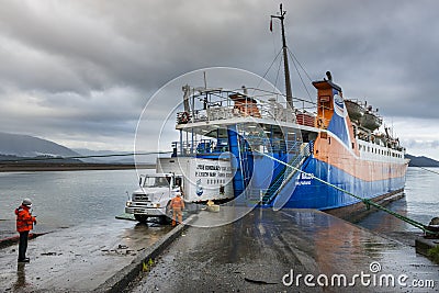 Truck entering in a Ferry Boat in the town of ChaitÃ©n, in Chile Editorial Stock Photo
