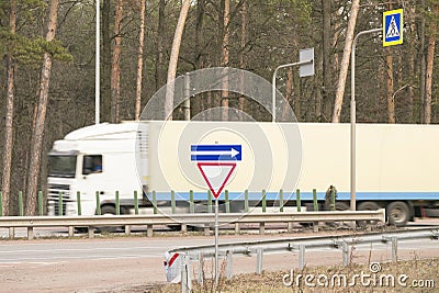 Truck fast moving on the road Stock Photo