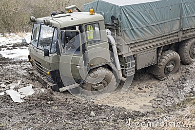 Truck got stuck in the muddy road Stock Photo