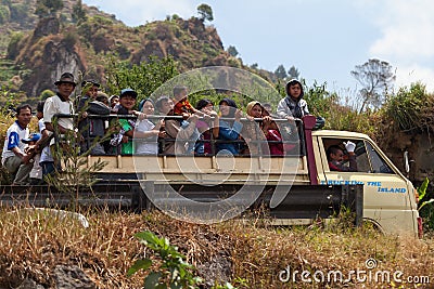 Truck with many happy people, Indonesia Editorial Stock Photo