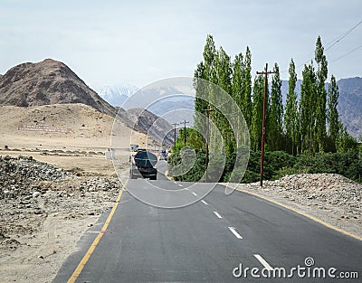 A truck on mountain road in Leh, India Editorial Stock Photo
