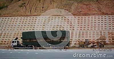 A truck parking on mountain road near Huu Nghi Border Gate in Lang Son, Vietnam Editorial Stock Photo