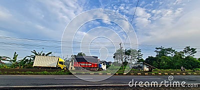 The truck passes through the highway Editorial Stock Photo