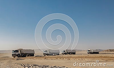 Truck passing through line Stock Photo