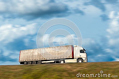 Truck on the road motion blur Stock Photo