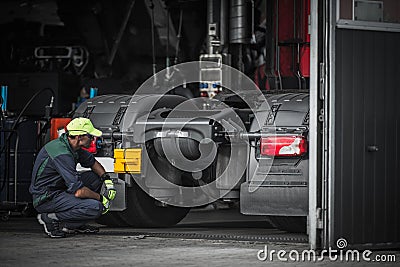 Truck Service Technician Job Stock Photo