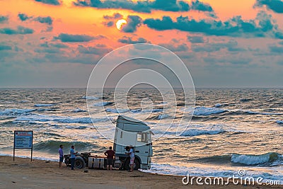 Truck stuck in the sand on the seashore Editorial Stock Photo