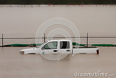 Truck Submerged in Flood Water Stock Photo