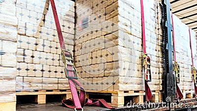 There is a loading to the truck trailer . fastening of freight in the trailer . Stock Photo