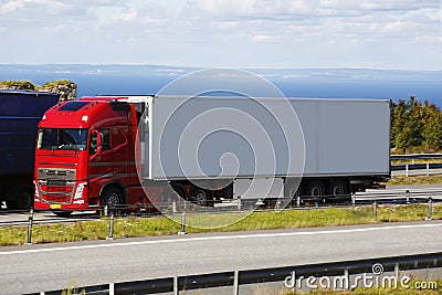 Trucking on scenic highway route Stock Photo