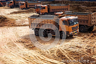 Trucks at construction site Stock Photo